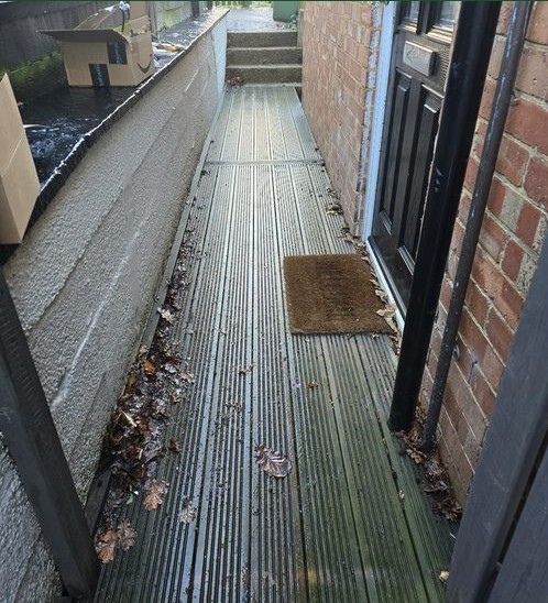 Decked side passage before pressure washing