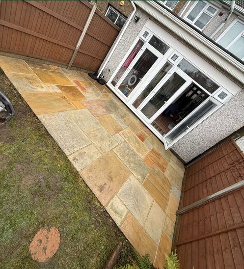 Sandstone patio after pressure washing by The Wright Exteriors