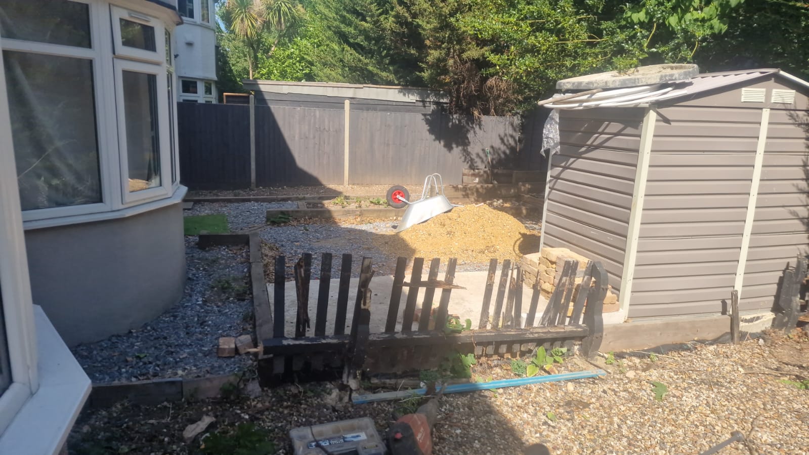 Garden fence before full fence replacement, old broken fencing